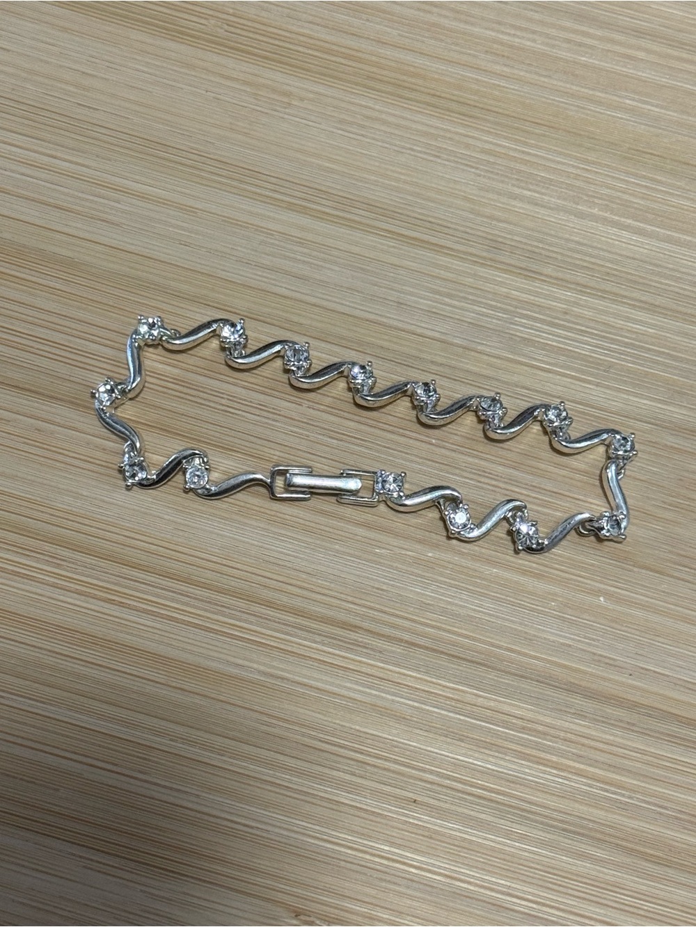Avon Silver Tone Wavy Link Rhinestone Bracelet